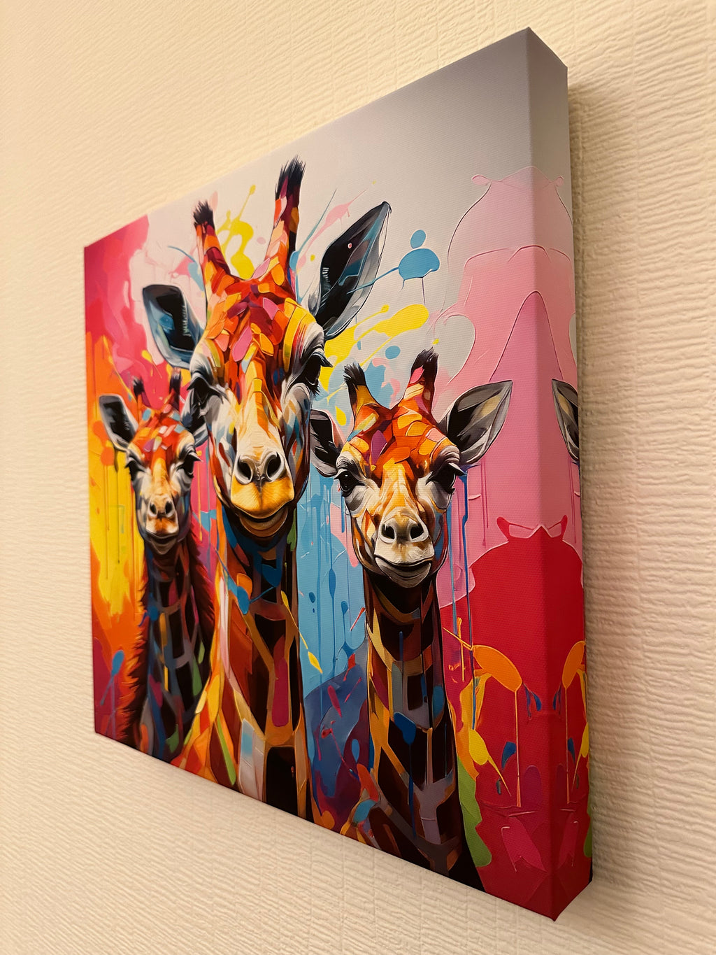 Colorful abstract painting of a giraffe on a beige wall