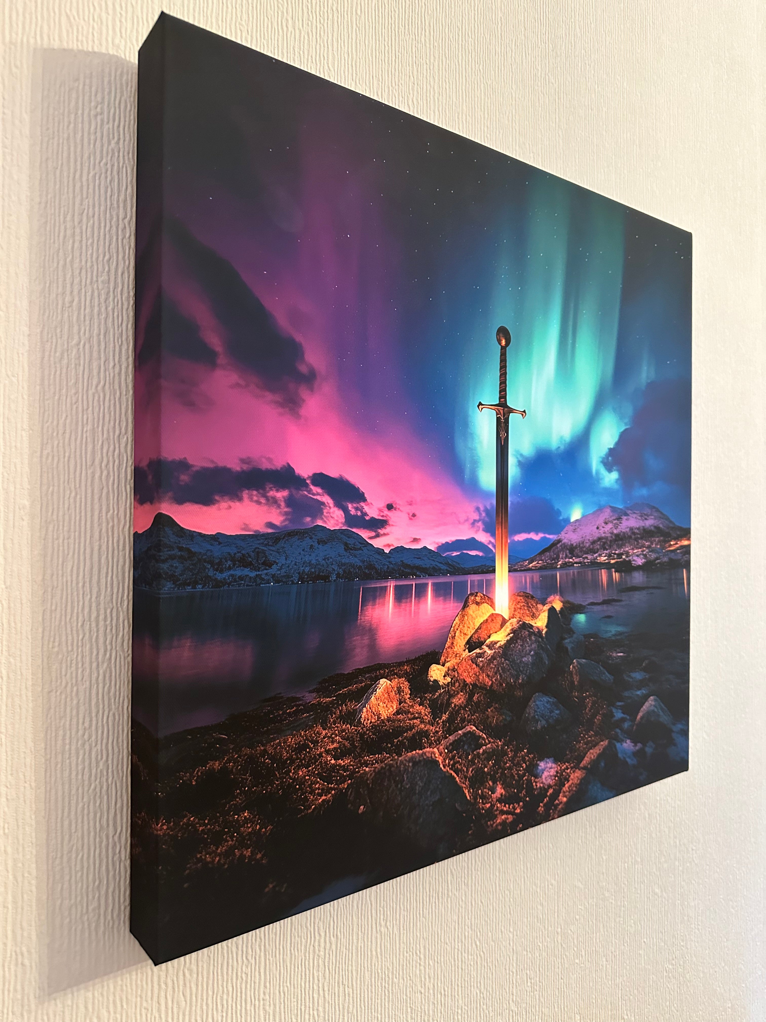 Canvas print with a fantasy scene featuring a sword in a stone, set against a colorful sky.