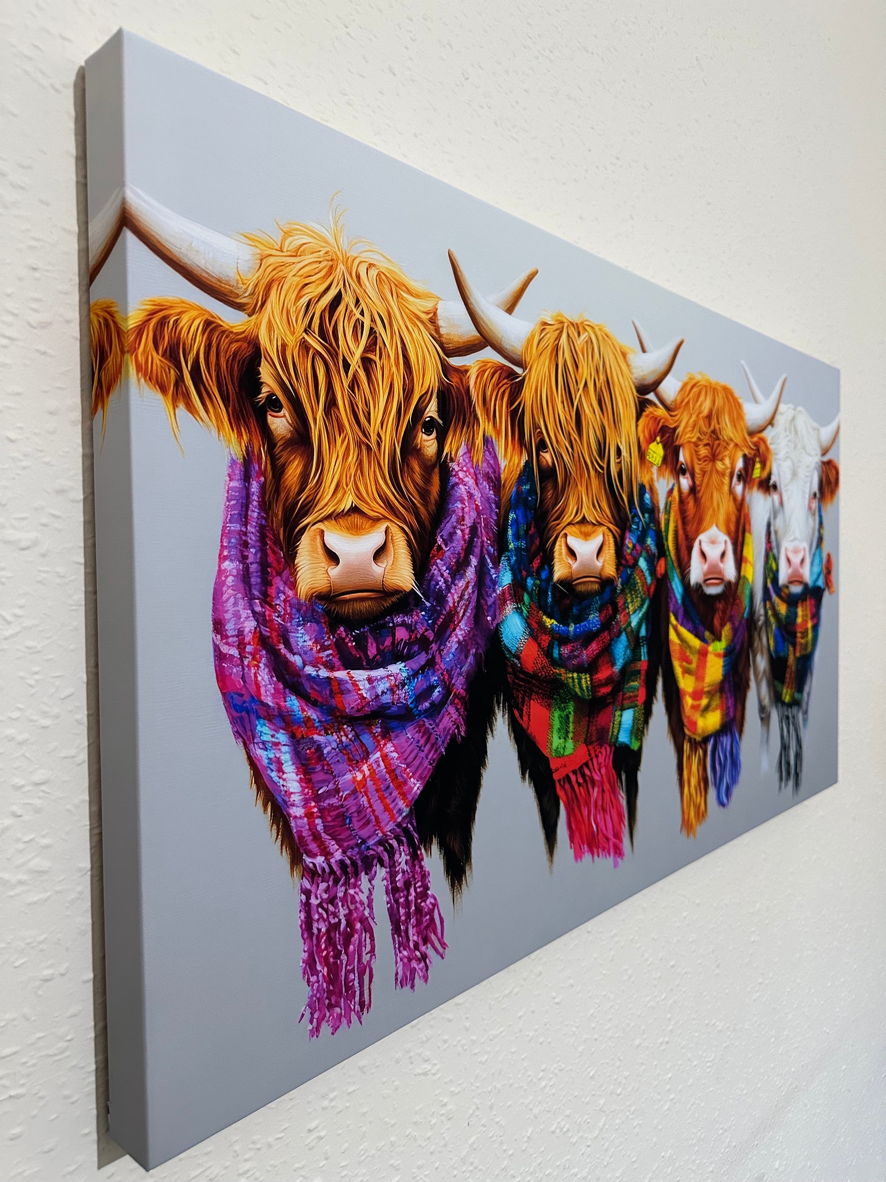 Canvas print of Highland cow heads with colorful blankets on a gray background