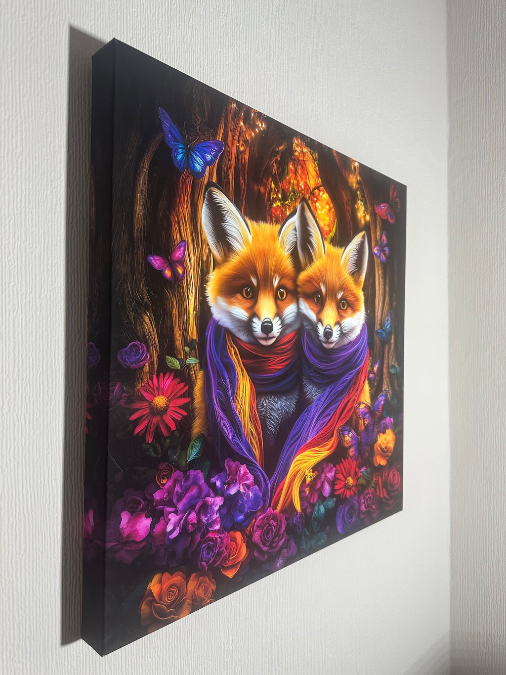 Two foxes with flowers and scarfs