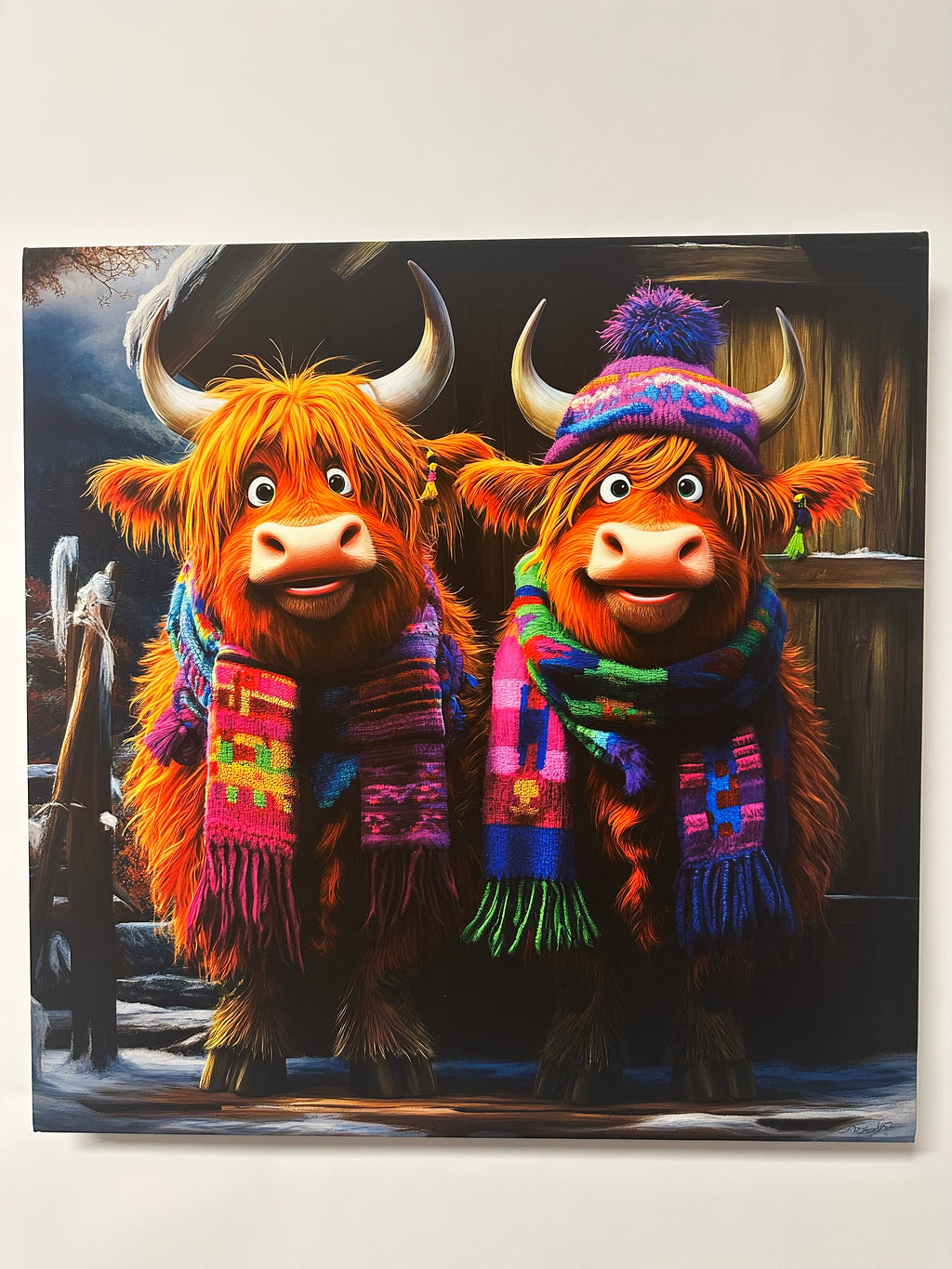 Two cartoon Highland cows wearing colorful sweaters and hats on a black background.