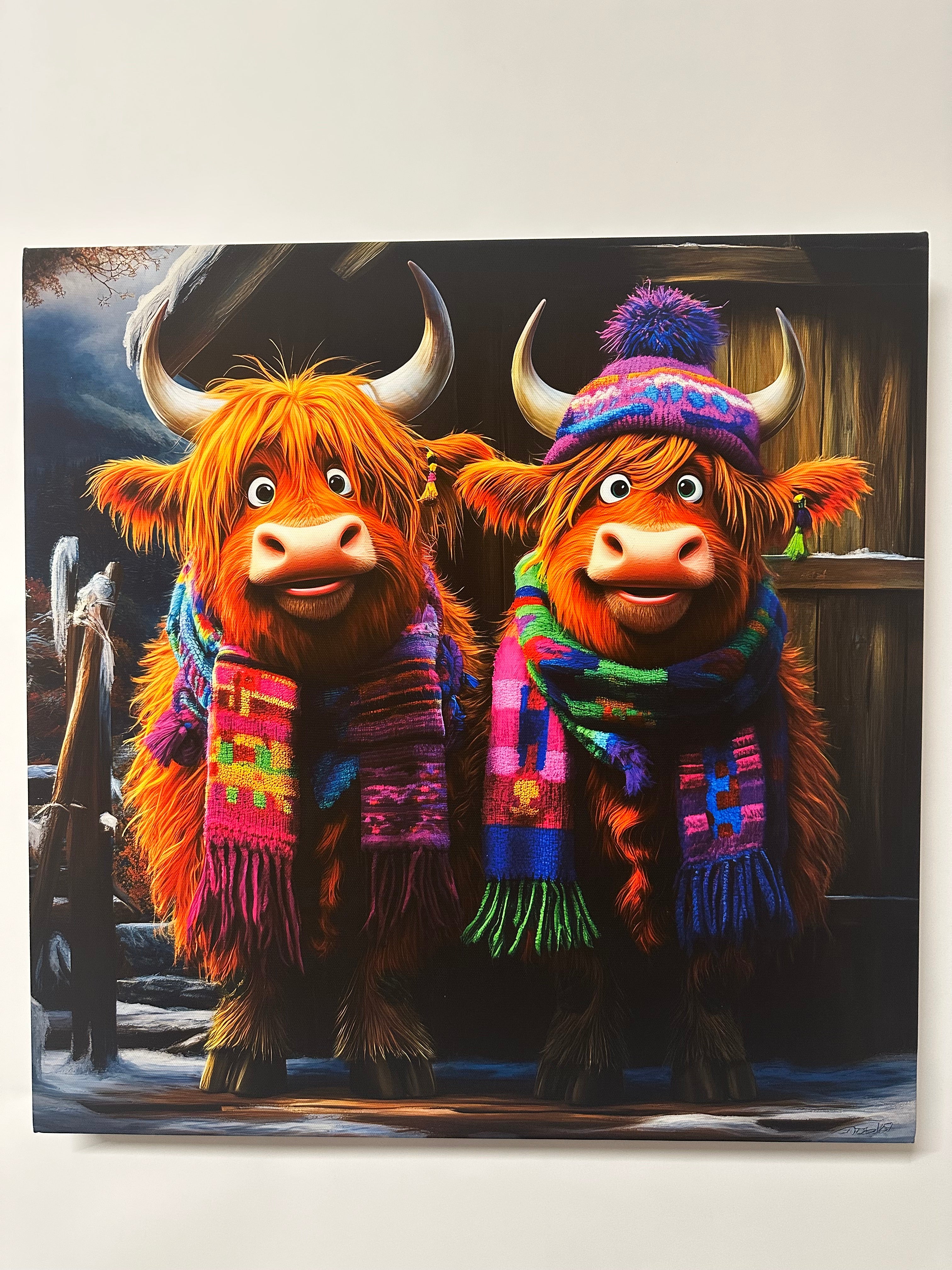 Two cartoon Highland cows wearing colorful sweaters and hats on a black background.