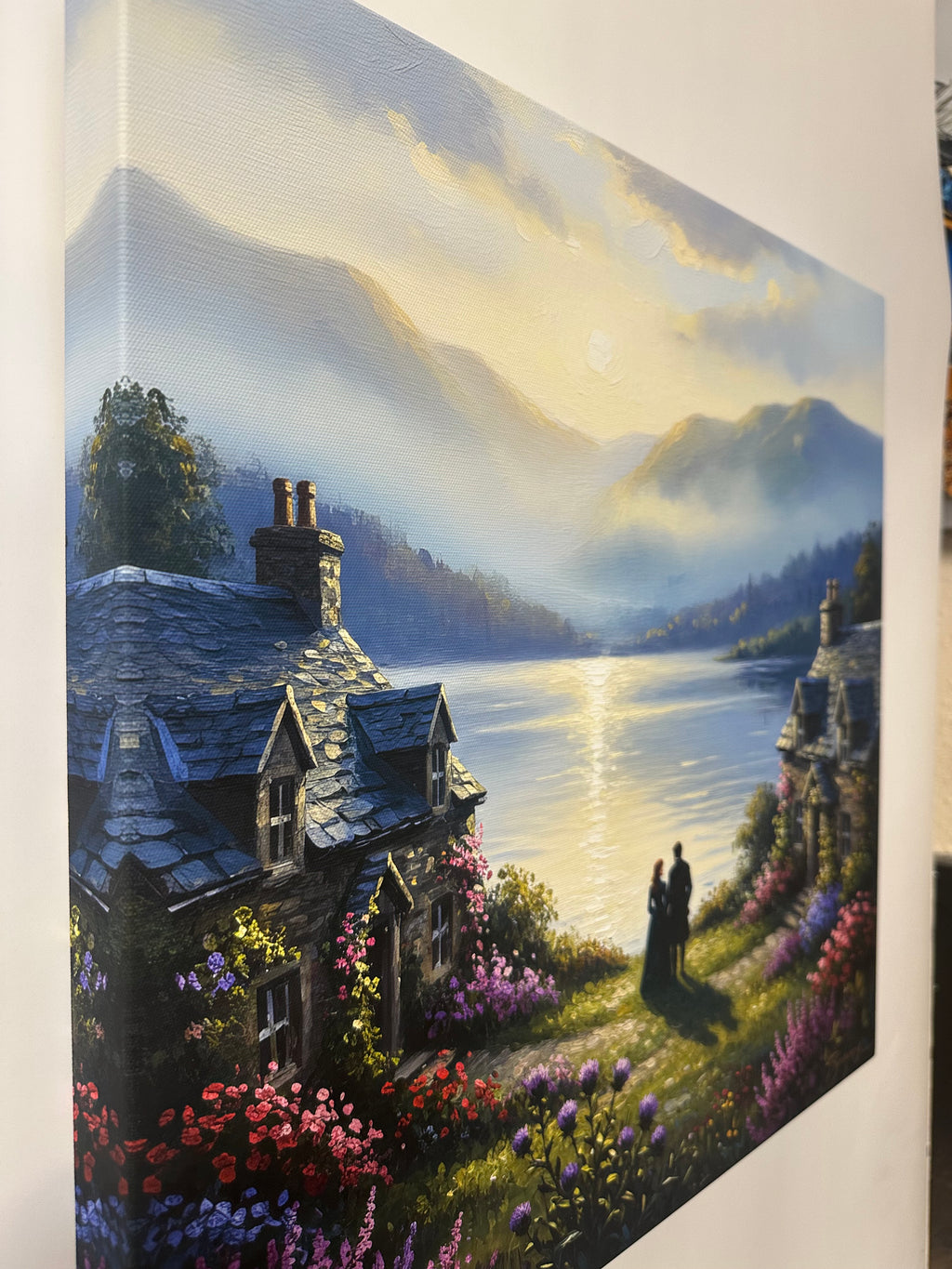 Painting of a house with flowers and mountains