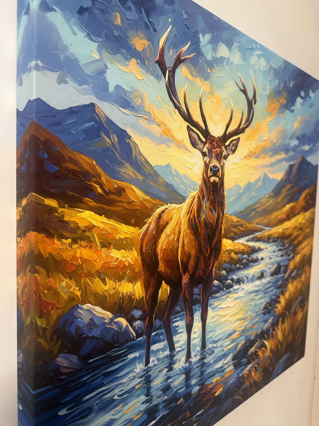 Painting of a stag with a mountainous landscape in the background
