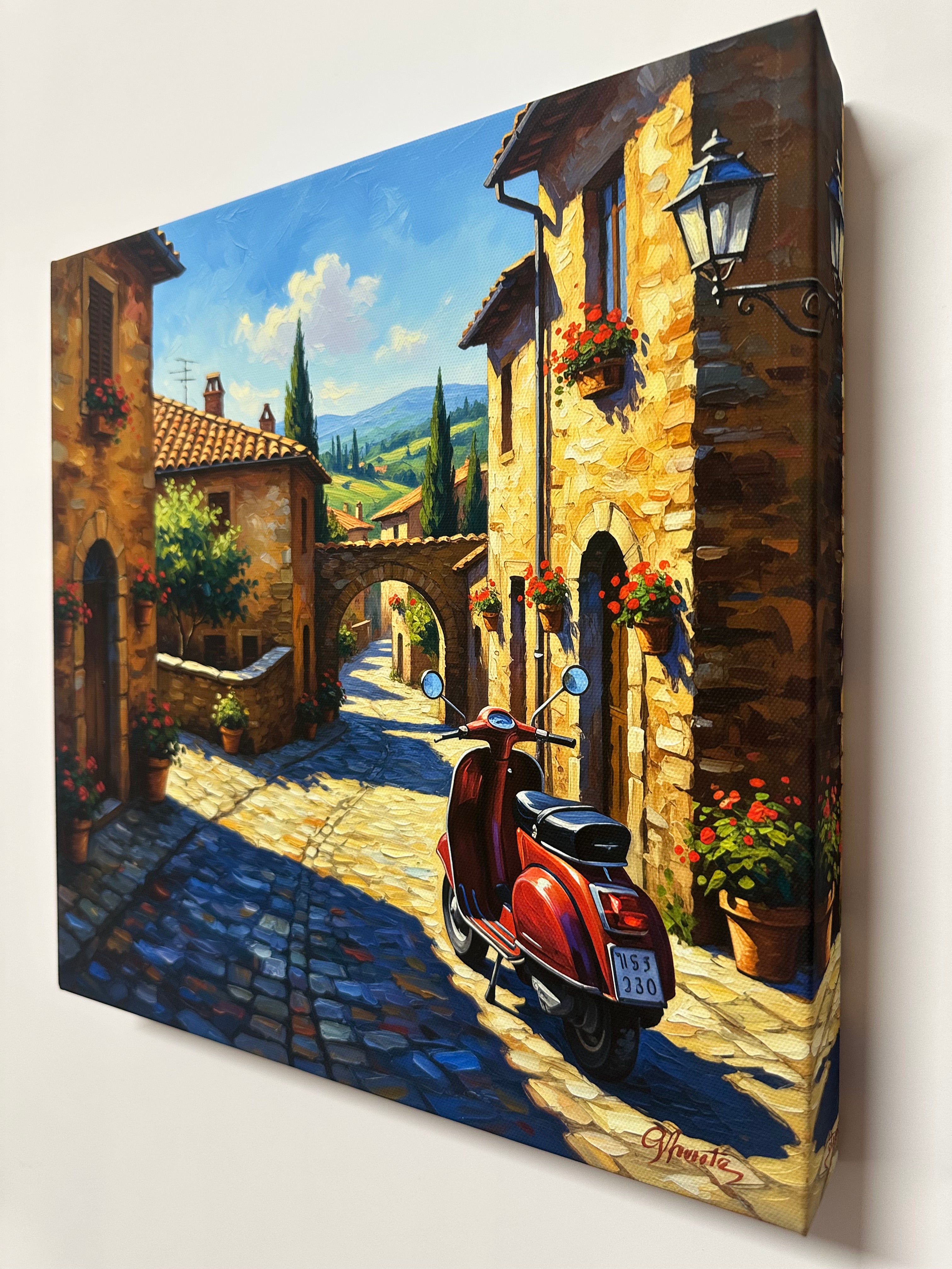 Decorative canvas framed wall art printed design of a street scene with a Vespa motorcycle.