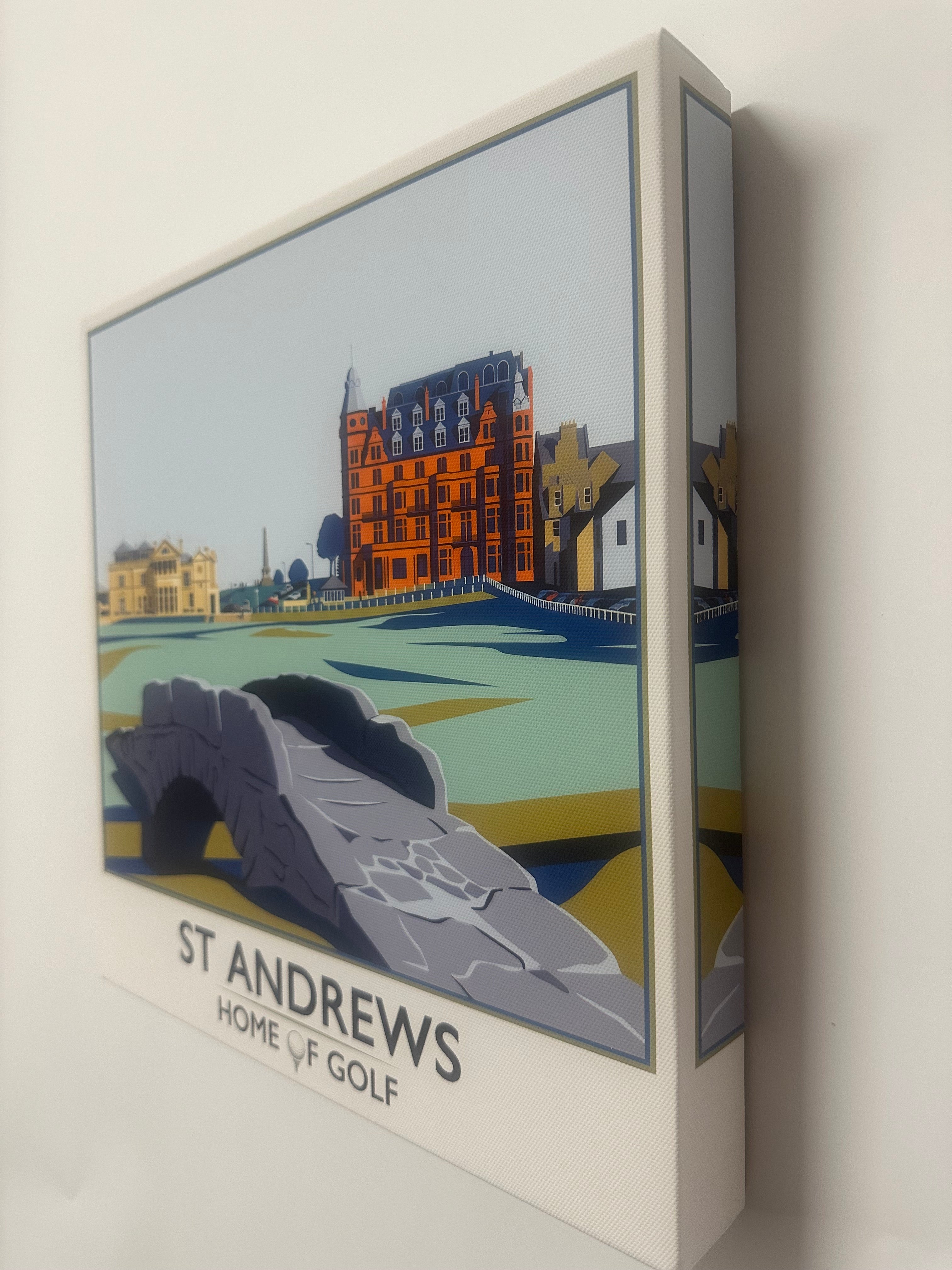 Product packaging with a graphic design of a building and text 'St. Andrews Home of Golf' on a white background.