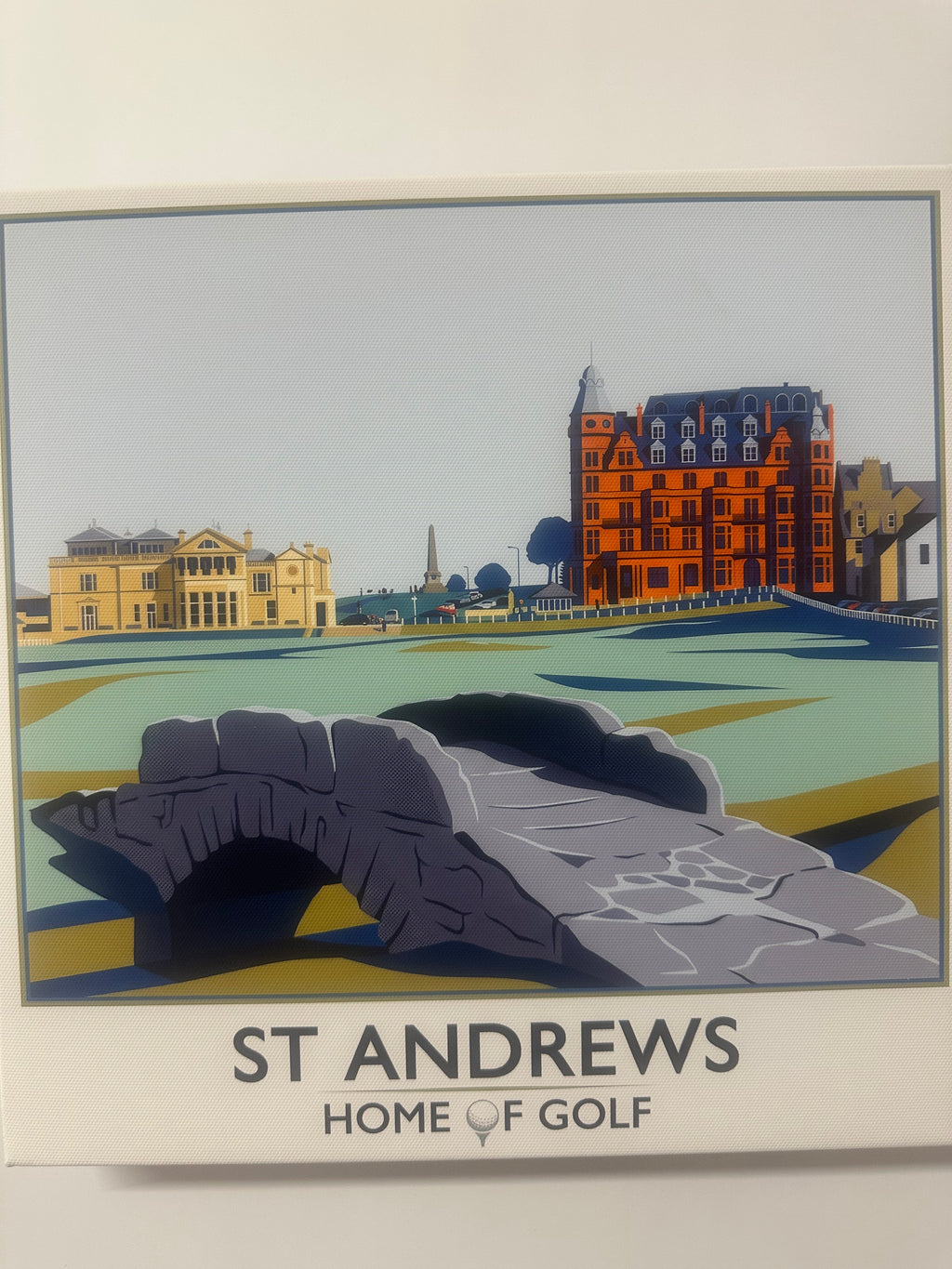 Poster of St Andrews with buildings and golf course illustration