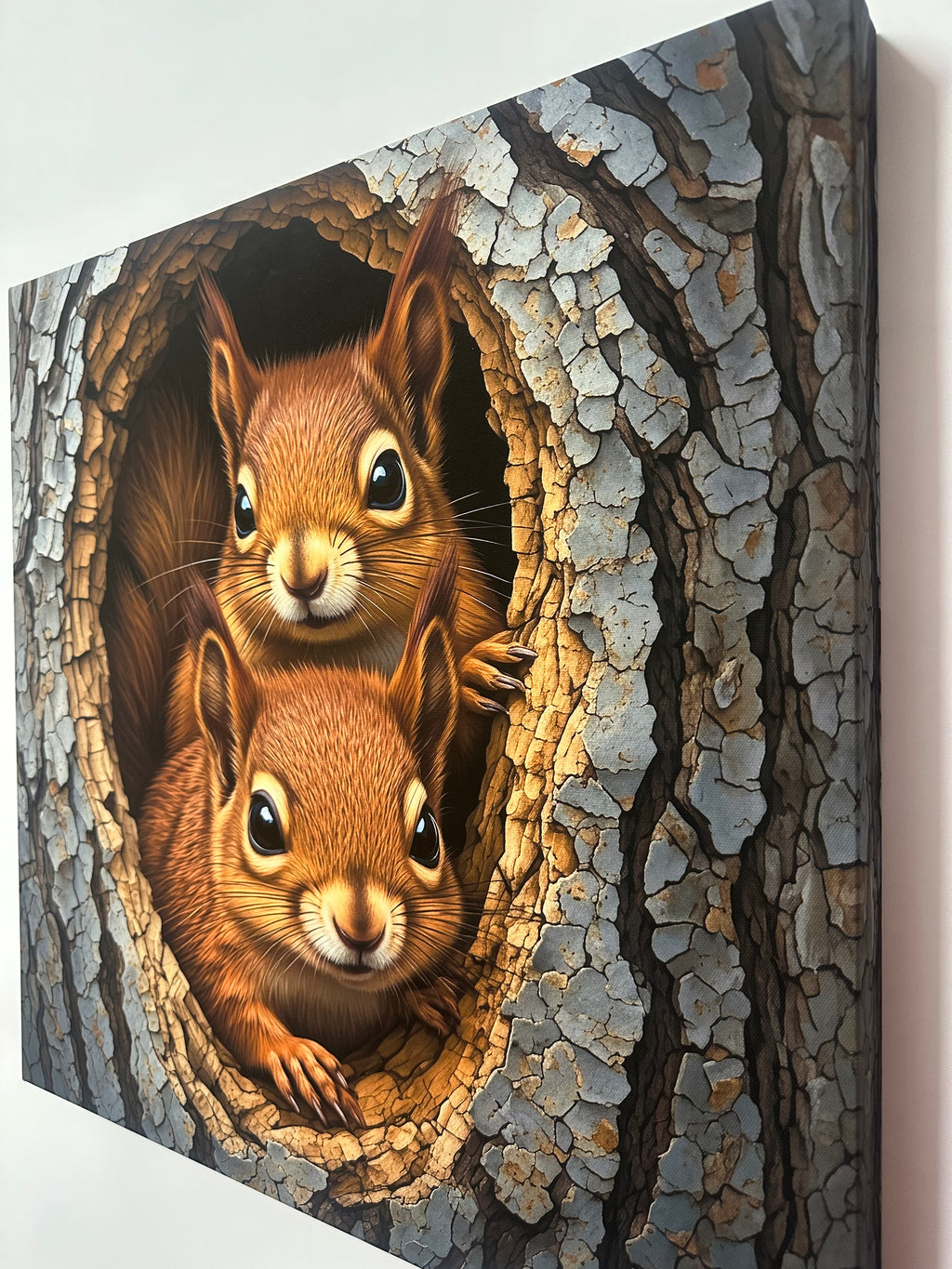 Two squirrels peeking out from a hole in a tree