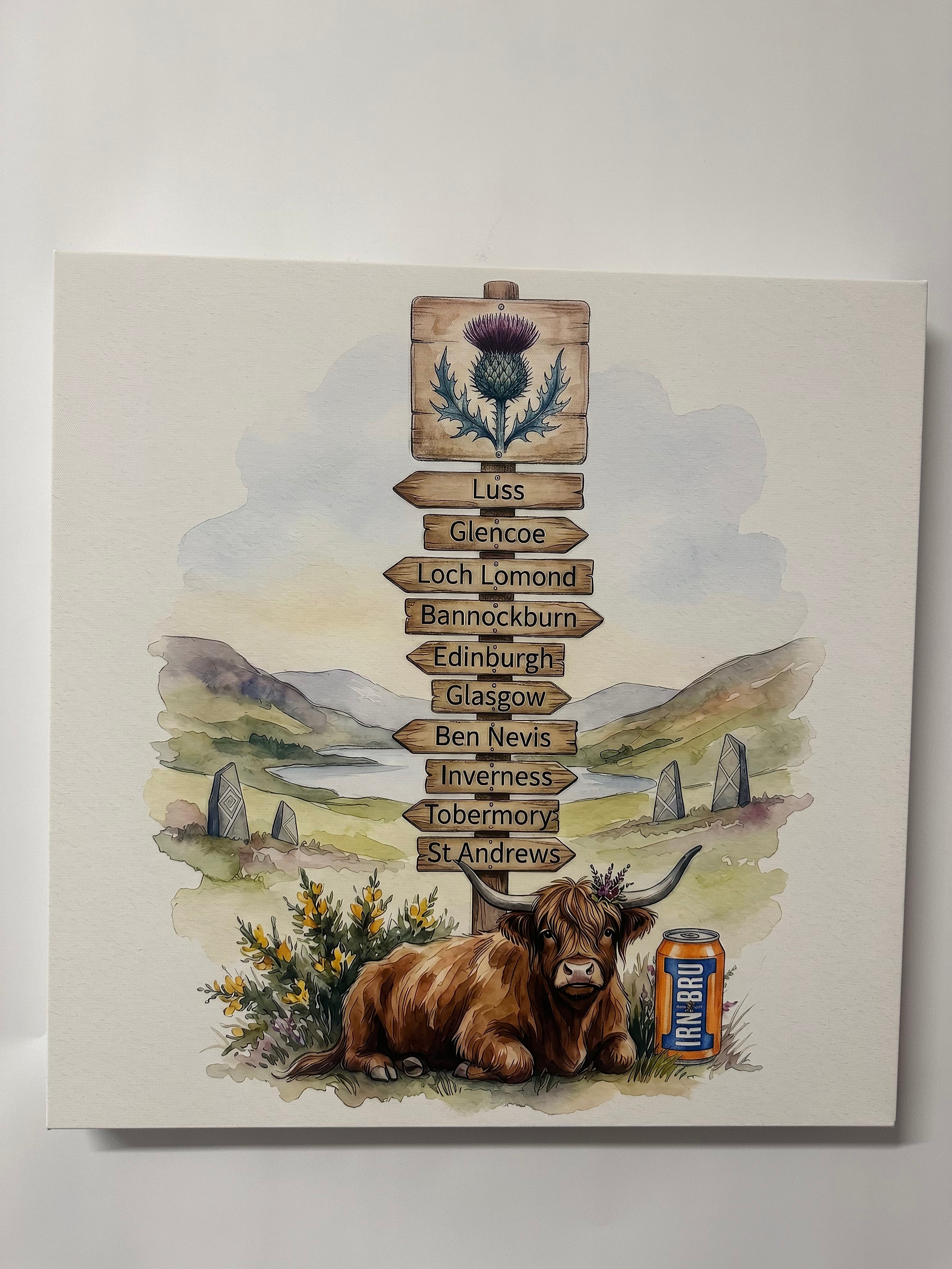 Scenic painting with a highland cow, thistle, and Scottish place names on a white background