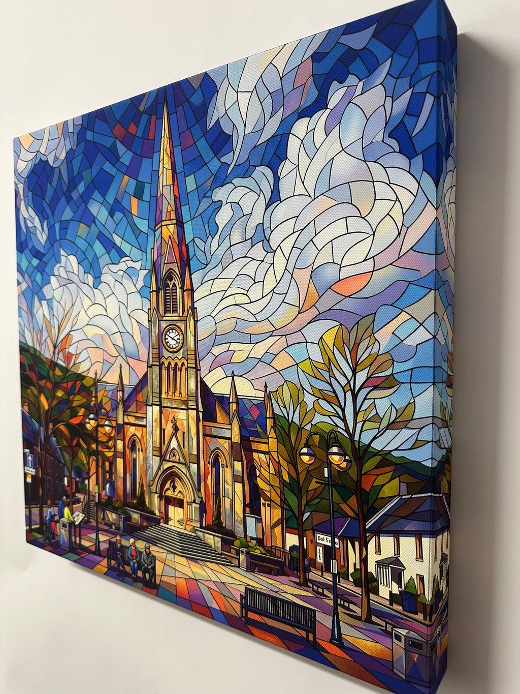 Stained glass-style artwork of a cityscape with a clock tower.