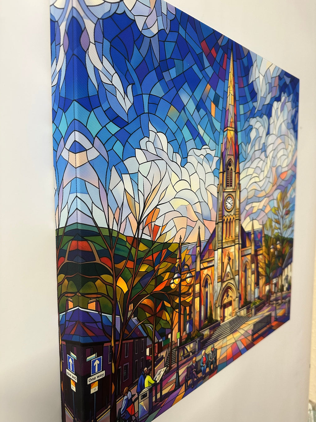 Colorful mosaic art piece on a white surface