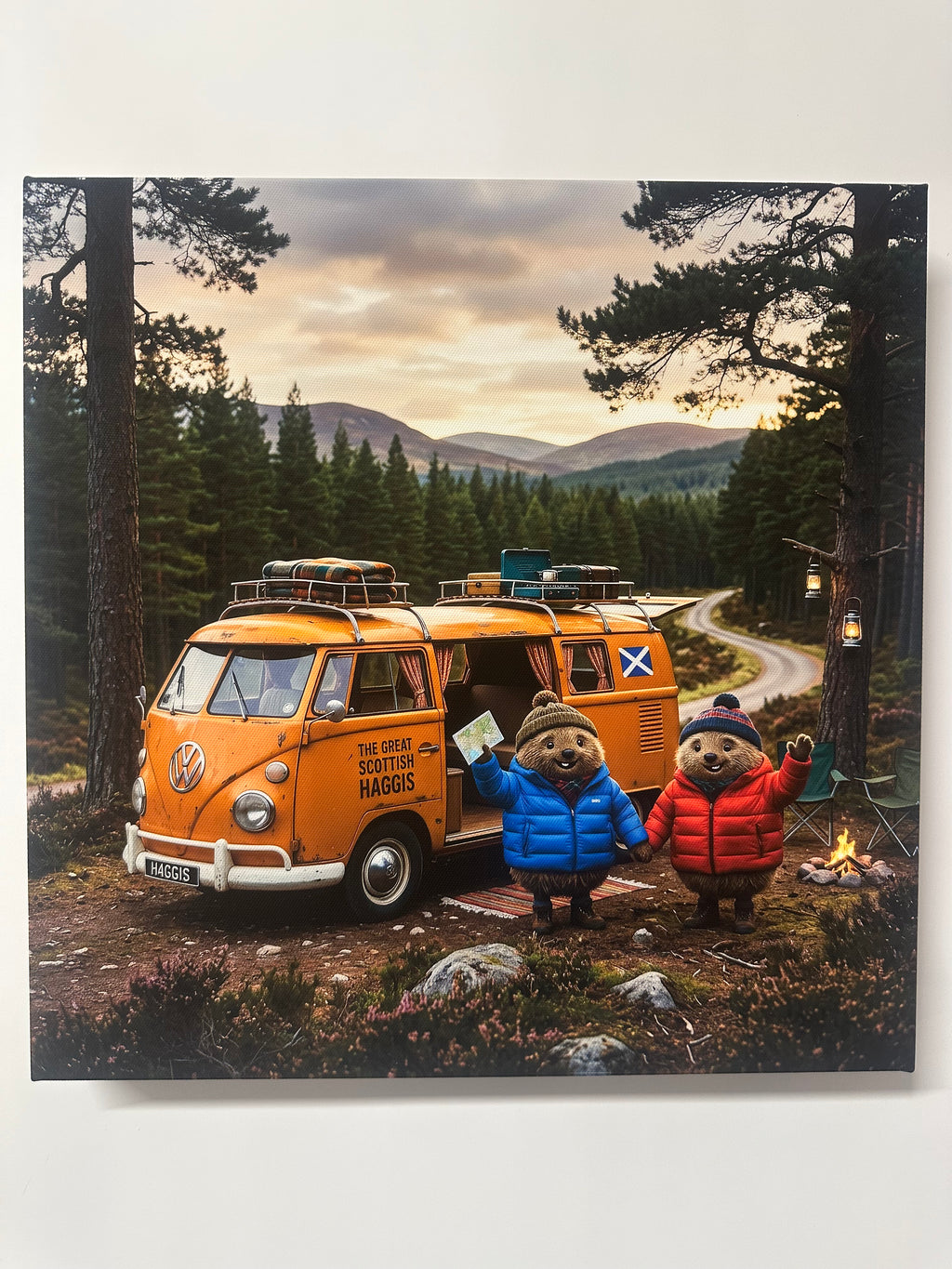 Two Scottish haggis in colourful jackets standing next to a vintage orange bus in a forest setting.